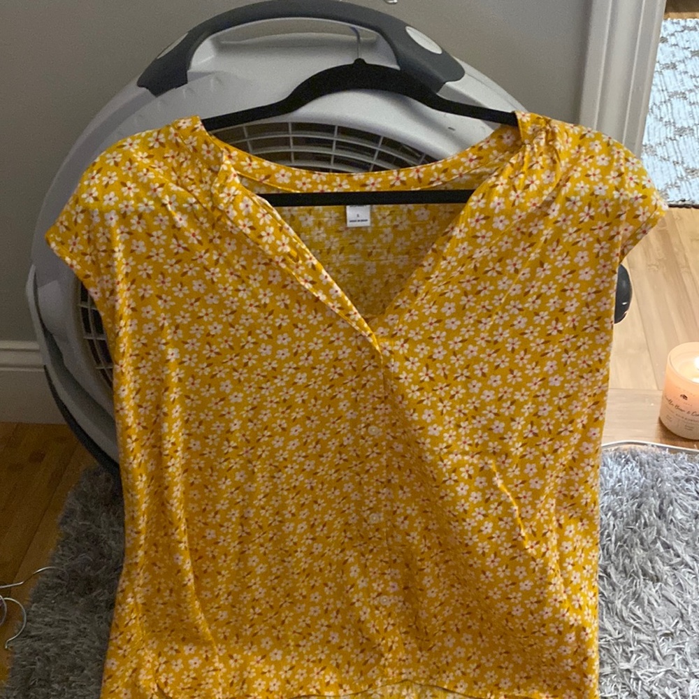 Yellow sleeveless blouse
